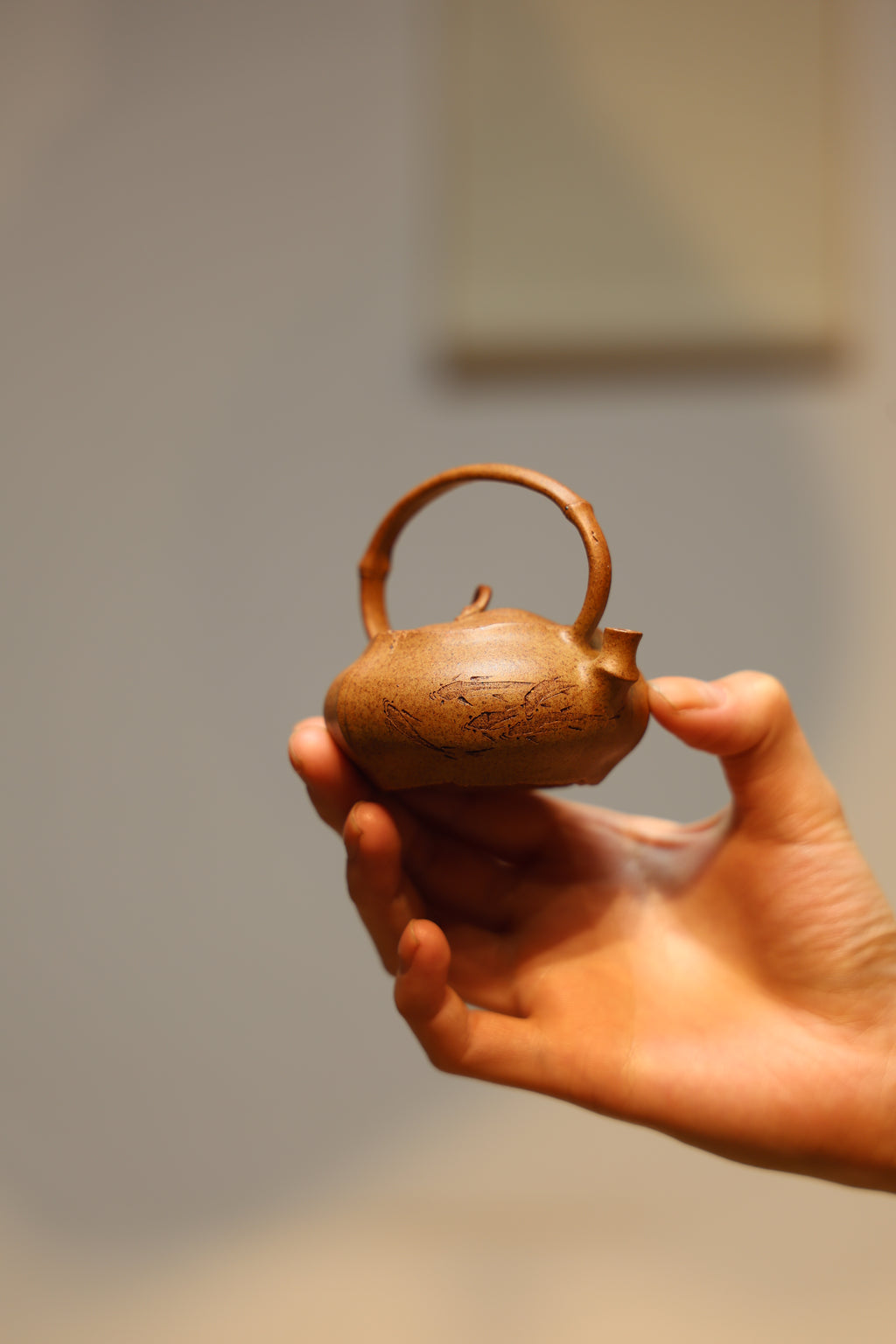 Handmade Yixing Zisha Teapot "Hua Yu Ti Liang" (Eclosion) | 化羽提梁 - 90ml
